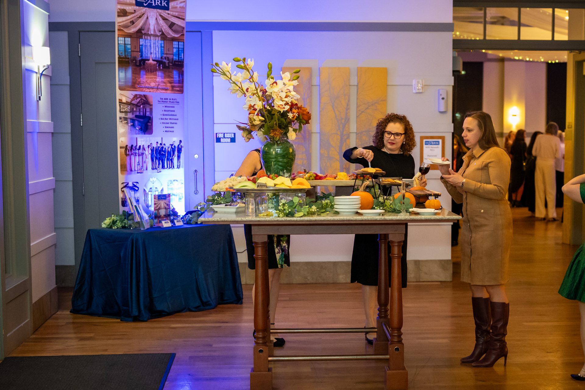 Guests at the reception table during a Women Driving Business event at The Ark in Katy, TX